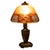 A good antique Art Deco American reverse painted landscape table table lamp, circa 1920. The dome shaped lampshade with a...