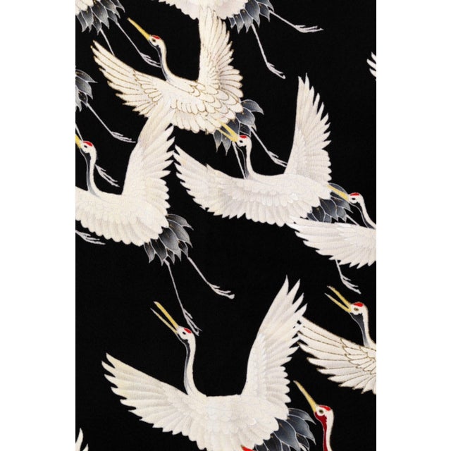Graceful and timeless, this vintage art print reproduction features Furisode with a Myriad of Flying Cranes (1910–1920),...