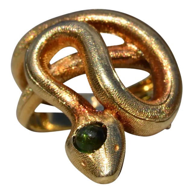 The Hibbs: Ladies 18K Yellow Gold Snake Ring set with Peridot For Sale