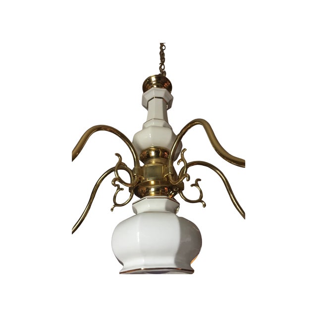 Lovely chandelier in the Irish Georgian style. White porcelain body with gold detailing. Five gold plated curved arms and...