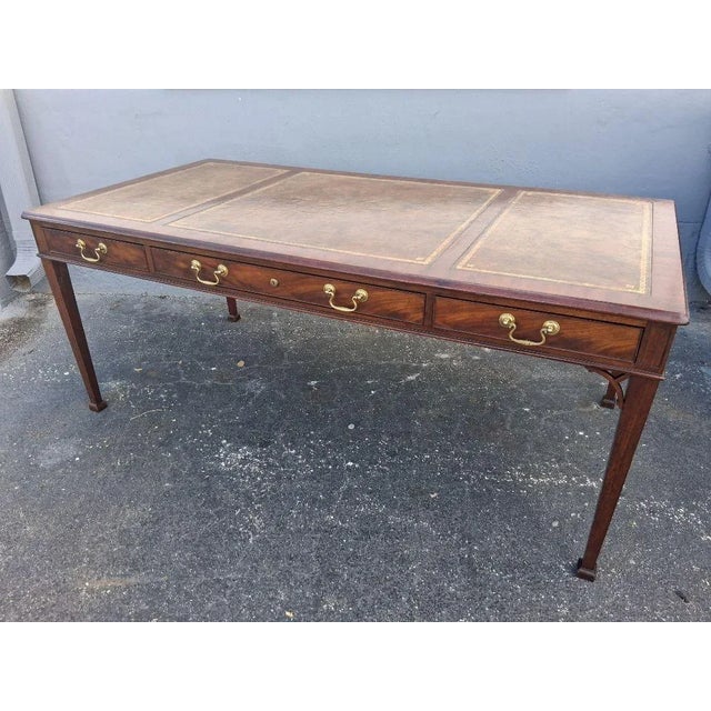 1940's Traditional style Executive Writing Desk by Baker Furniture Company Collectors Edition. 3 part leather top. 3...