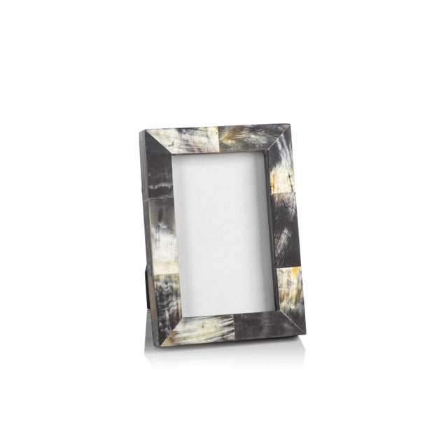 This stunning picture frame offers a unique, elegant way to showcase treasured photos of your loved ones. This beautiful...