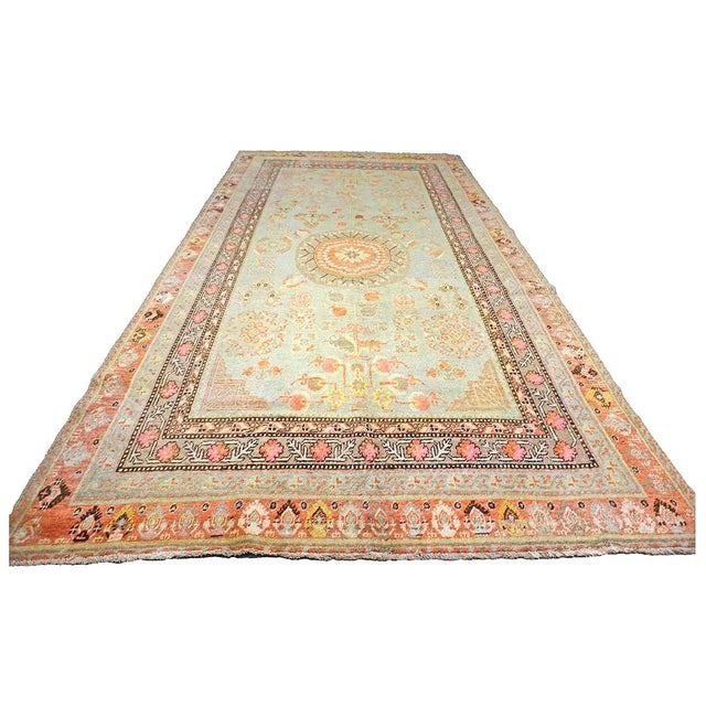 Condition: Antique Circa: 1880s Origin: East Turkistan Design: Khotan Actual Size: 6'3" X 12'1" Color: Green, Orange, Tan,...
