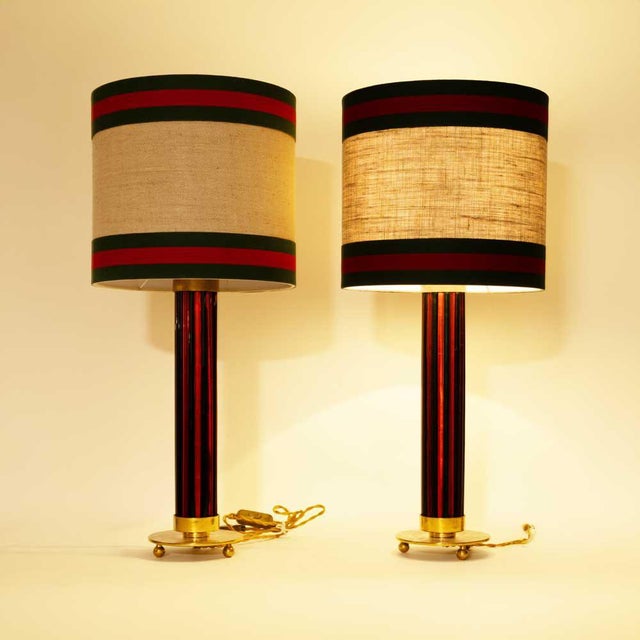 Pair of Murano glass rods on brass metal table lamps with Gucci inspired colours rim shades.Brass metal structure, base on...