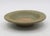 Chinese Yuan Dynasty celadon glazed pottery libation dish, circa 1271-1368. Red pottery. Longquan Region (SW China). Old...