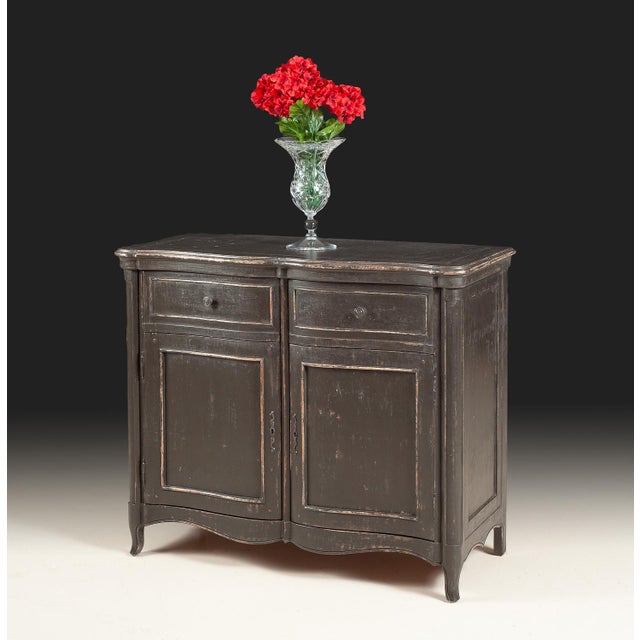 Handcrafted in Italy, this French Country cabinet features a distressed black finish with warm brown undertones that...
