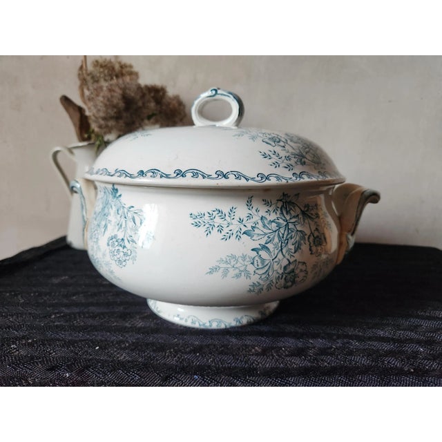 French soup tureen made by L'Épargne Toulouse. It is a rare item of terre de fer, ironstone, from the eglantine series,...