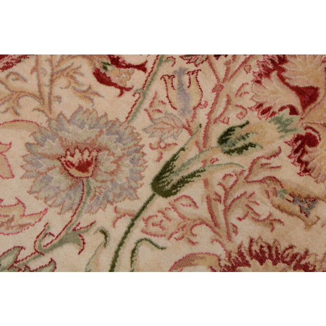 Designed with mesmerizing intricacy and gorgeous color palette, this hand-knotted masterpiece demonstrates the beauty and...
