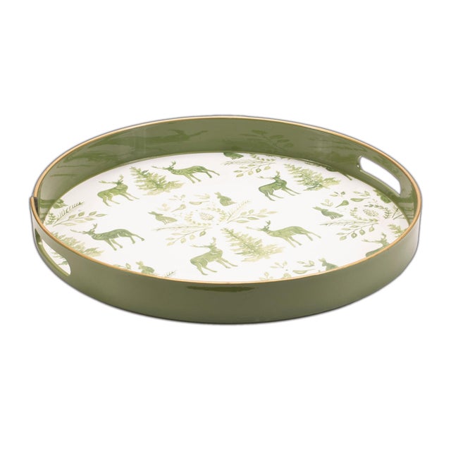 Bring rustic charm to your holiday gatherings with this round deer and pine tree print tray. Featuring wintry green and...