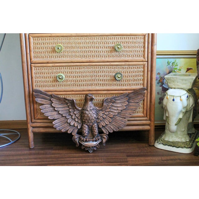 Vintage American bald eagle wall hanging made by Universal Statuary Corp. Dated 1964. The bronze colored eagle is...