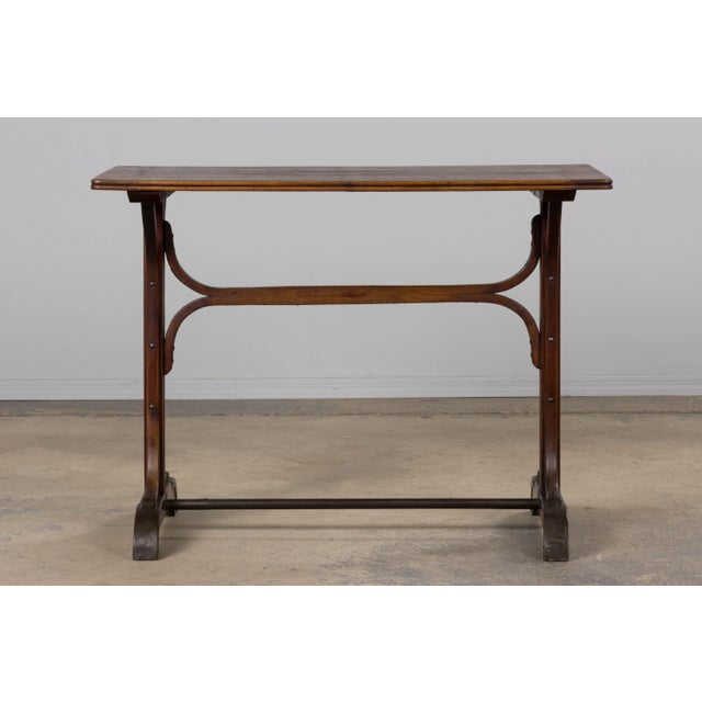 An elegant early 20th century French bistro table in the Thonet style, sourced in Provence, France. Crafted from solid...