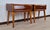 An extraordinary pair of minimalist Art Deco nightstands in herringbone walnut, walnut quill, and maple. Furrowed edges...