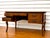 Handsome and practical best describe this wide French writing desk. Made of cherry wood, this desk features 2 side drawers...