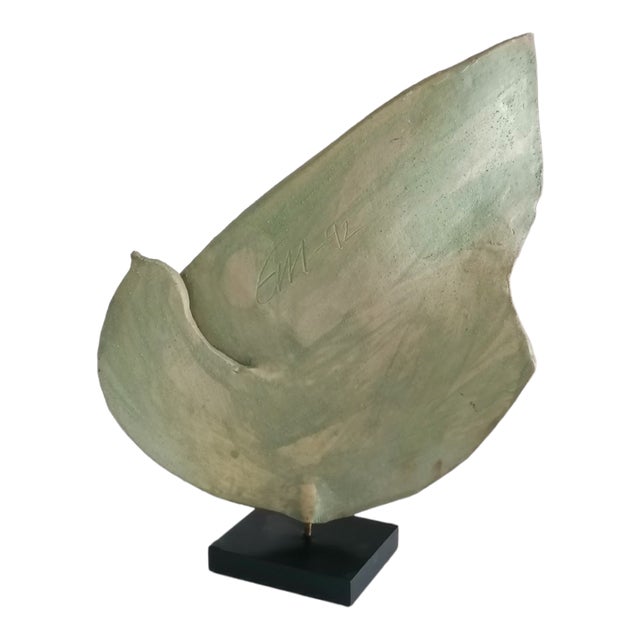 Add a touch of serenity and sophistication to your home with this vintage ceramic dove sculpture, a unique piece with a...