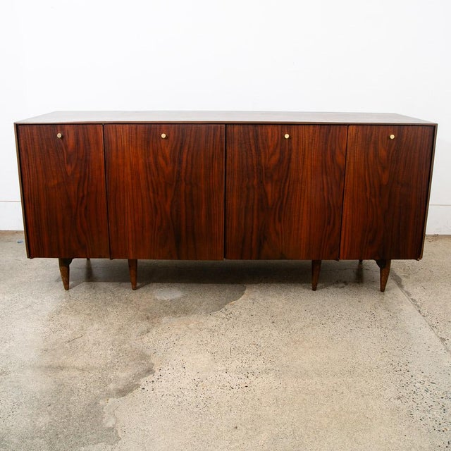 Wow! this cabinet houses a large dining table inside with 4 leafs. The cabinet itself has tons of room for storage on the...