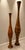 A elegant pair of handcrafted segmented wood floor vases showcasing exceptional craftsmanship and sculptural design. Each...