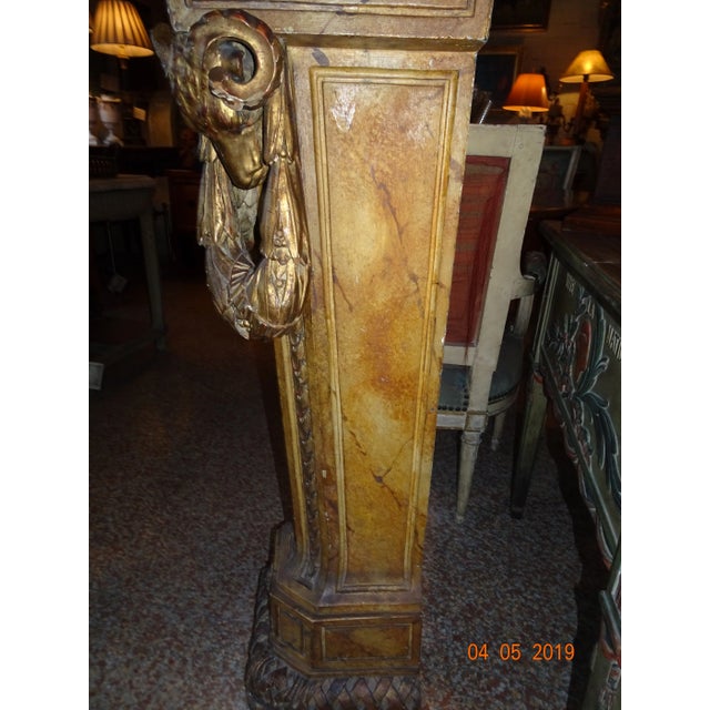 Stunning 19th century French pedestal . Carved gilt wood and faux finish marble paint in ochre color. Jules Cesar profile...