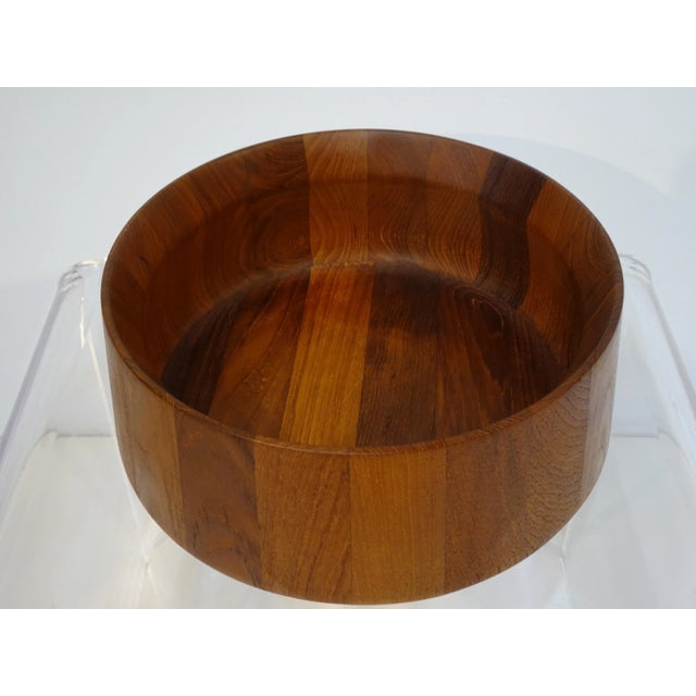 A teak serving bowl designed by the iconic designer Jens H. Quistgaard who's organic pieces including pepper mills,...