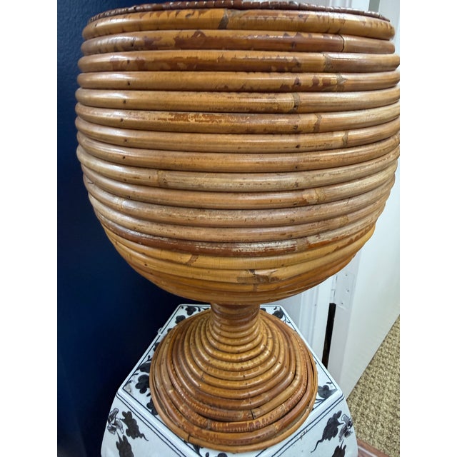 This is a most unusual pencil reed urn in the style of Italian designer Gabriella Crespi. who made this high end look...