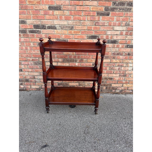 This is a beautiful 19th century English trolley or etagere. The shelves show such amazing patina and age and the turned...