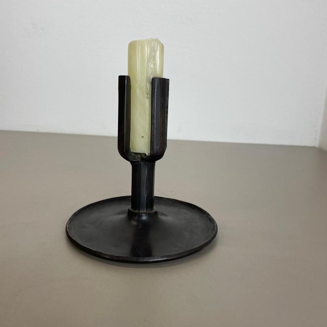Article: Brutalist candle holder Origin: Germany Design producer: Manfred Bergmeister, Kunstschmiede Ebersberg Material:...