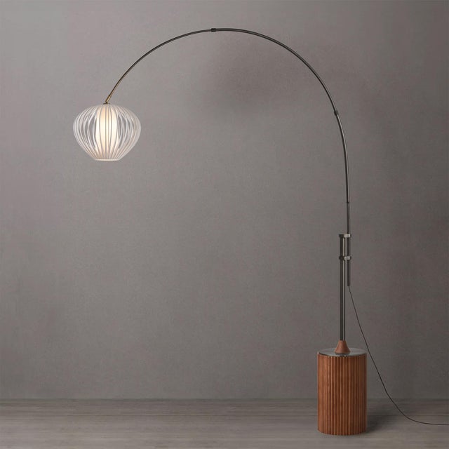 The Tambo Arc Floor Lamp is a striking addition to NOVA's lighting collection, showcasing a black nickel steel body paired...