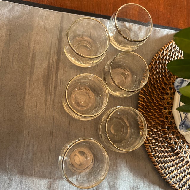 These are vintage Dorothy Thorpe, silver rimmed roly-poly bar glasses. Complete set of six. Perfect condition . Stunning.