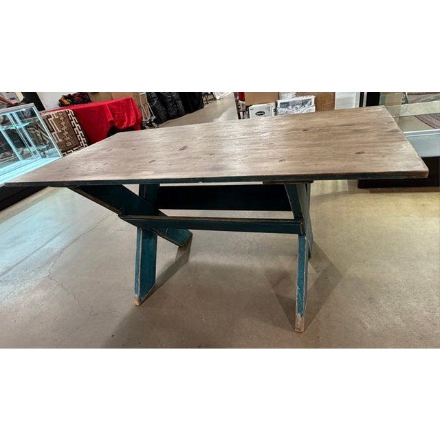 19thc Blue painted scrub top saw buck table from New England. Early hand made wooden table with original square cut nail...