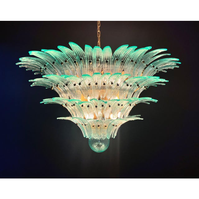 DUTIES FREE A breathtaking statement in blown glass and gilded metal, this Palmette ceiling light commands a room with the...