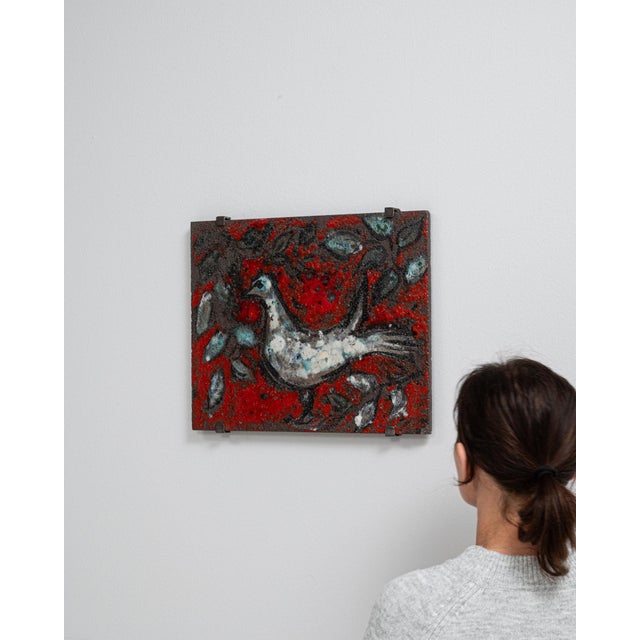 A striking piece of mid-century Belgian art, this textured concrete wall panel depicts a stylized bird in motion, rendered...