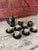 This vintage Kutani tea set features a stunning matte black and gold hand-painted design with scenic Japanese landscapes....