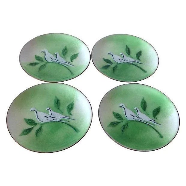 1960's; Enameled green and white glazed, hand crafted, set of four jam, or preserve dessert dishes, over copper, with dove...
