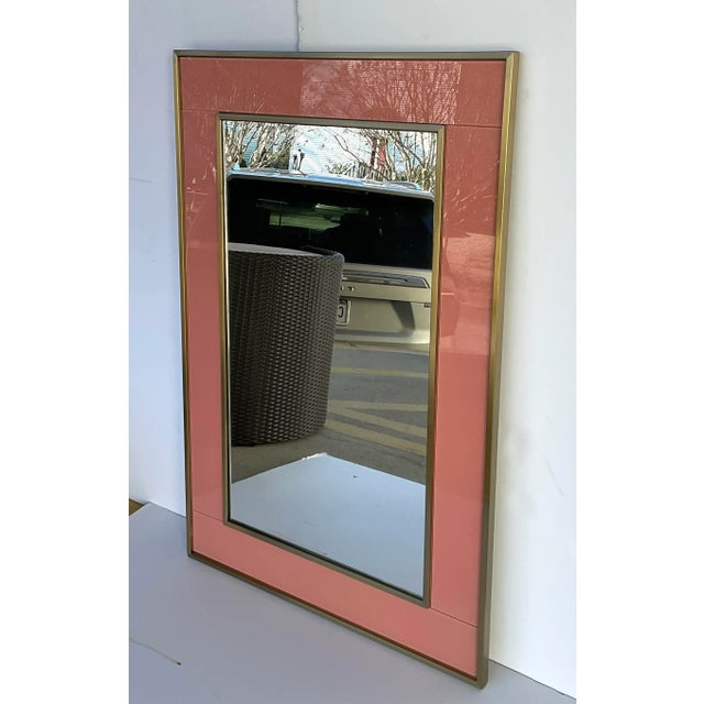 Stylish Modern Brass and Salmon Glass Wall Mirror, showroom floor sample