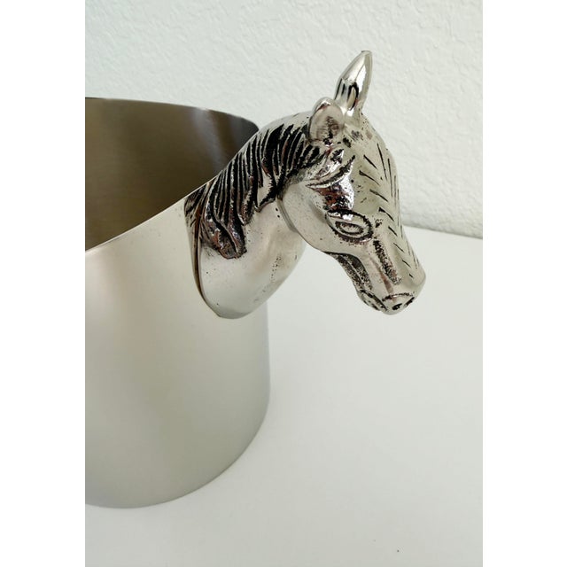 This chic oval-shaped ice bucket or bottle chiller is a classic with a touch of whimsy. It features a stainless steel body...