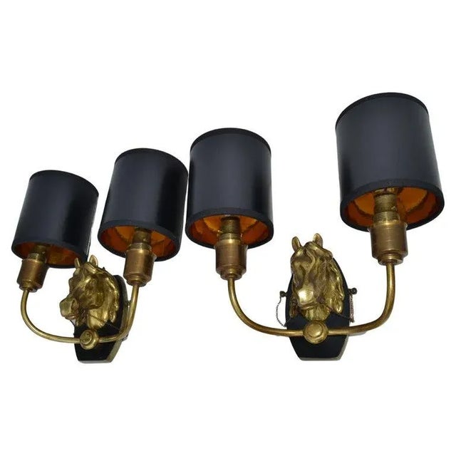 Superb pair of Maison Baguès Horse sconces, Wall lights in 2 patina bronze. 2 lights, 40 watts max bulb per light In...