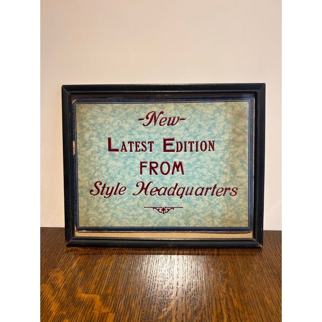 Vintage sign reads “New - Latest Edition from Style Headquarters” Pale blue paper with glossy red text Paper measures 9...