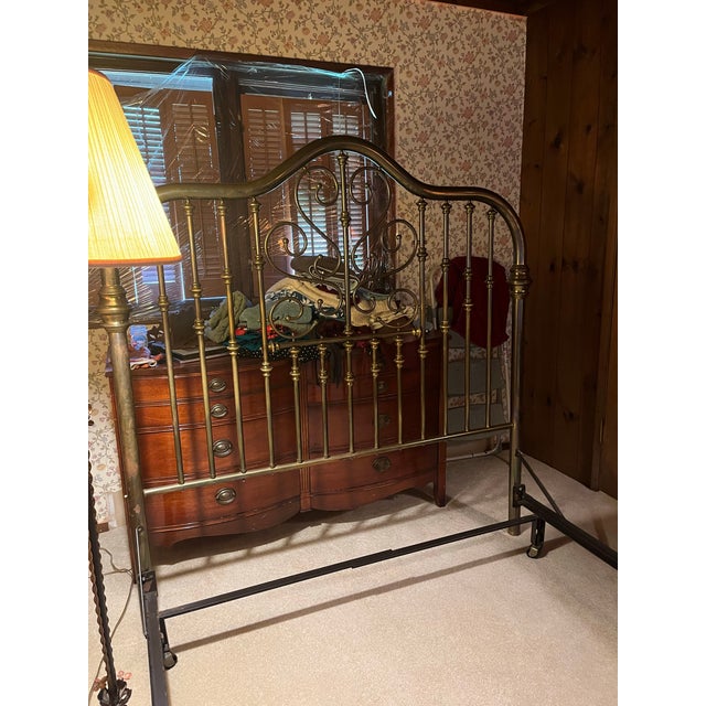 Stunning vintage Queen-size solid brass bed. Featuring a dramatic, extra-tall 64" arched silhouette, this stately frame...