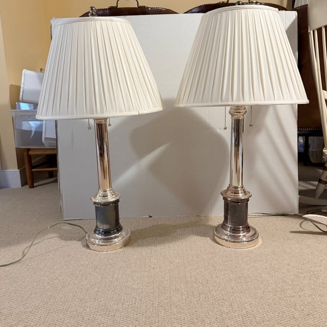 Pair of Vintage Ralph Lauren Tall Column Lamps Pair of tall Tuscan column-form lamps crafted in silvered solid brass with...