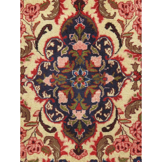 Hand-knotted wool rug from Bidjar, a town in northwestern Iran (Kurdistan province), featuring an ivory field with a...