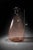 Mobile-Ready Description Oversized blush pink glass demijohn vase standing 25 inches tall. The sculptural bottle form...