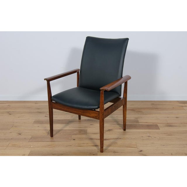 The armchair model Diplomat was originally designed by Finn Juhl to furnish numerous Danish embassies and consulates...