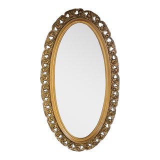 Early 1900s French Style Hand Carved Gilded Oval Beveled Wall Mirror For Sale