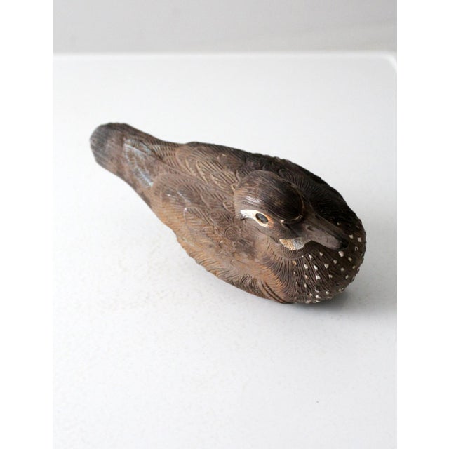 This is a vintage Flambeau wood duck duck decoy. The American crafted decoy is cast plastic with nice detailing and...