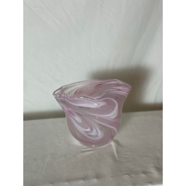 This murano-style wide vessel can be used as a vase or as a bowl, or can simply be an eye catching decorative piece for...