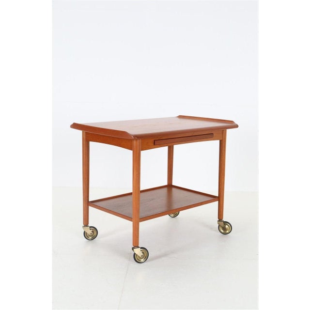 Danish Teak Serving Trolley with Tray by Mogens Hansen, 1960s, in Very Good conditions. Designed 1960 to 1969 This piece...