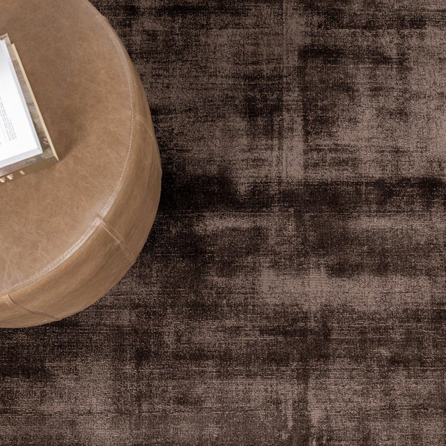Soft luxurious chocolate brown silk-like viscose-cotton rug. Lightly distressed finish for texture and dimension....