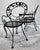 1940s Woodard Furniture Tete-A-Tete Wrought Iron Outdoor Chantilly Rose Tete a Tete Chair Bench Loveseat For Sale - Image 5 of 11