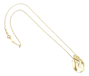 Late 20th Century Tiffany & Co. Peretti Yellow Gold Madonna Medium Pendant Necklace