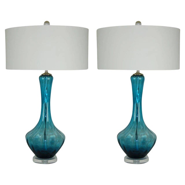 Matched pair of Italian TEAL BLUE Petticoat lamps with vertical optics. The color of the glass and clarity of same are...