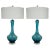 Matched pair of Italian TEAL BLUE Petticoat lamps with vertical optics. The color of the glass and clarity of same are...